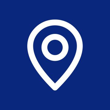 White map pin icon on a blue background.